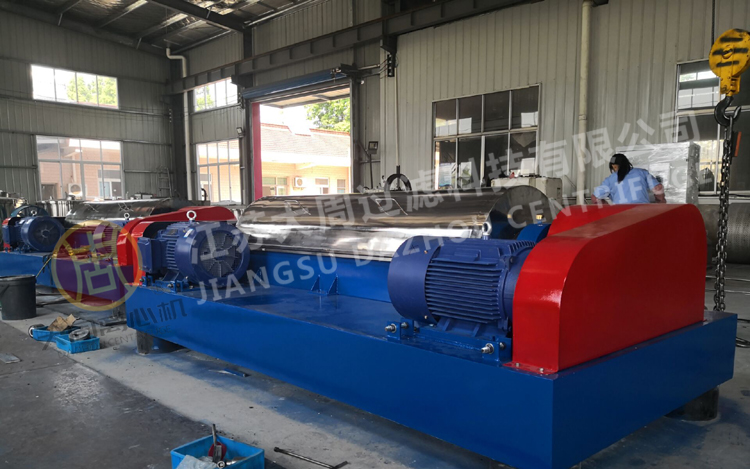 臥式螺旋卸料沉降離心機(jī)工作原理